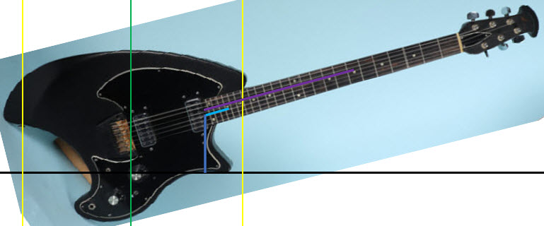 Shows ergonomic measurements for an Ovation Breadwinner guitar played while standing