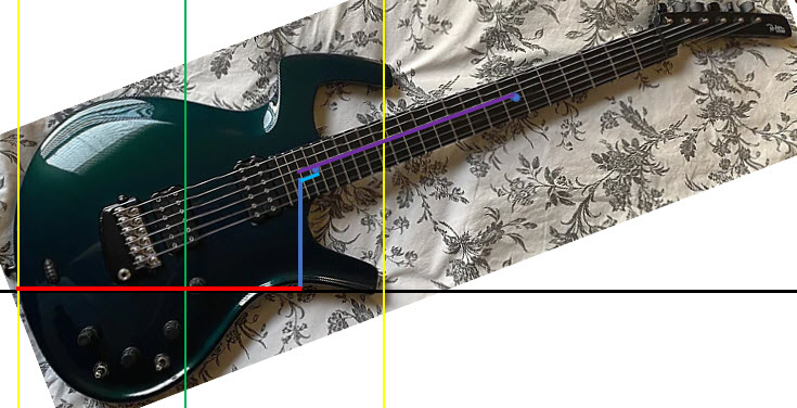 Shows ergonomic measurements for a Parker Fly guitar played while sitting or standing