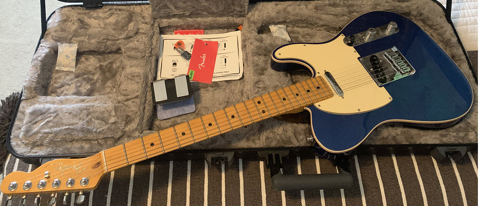 Cobra blue ultra telecaster guitar and electric guitar  leg rest in carry case